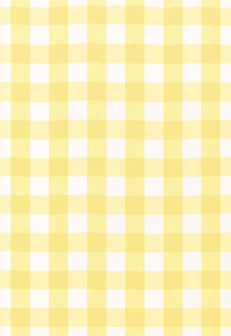 Embrace the cheerful and bold energy of Aesthetic Yellow Plaid Wallpaper