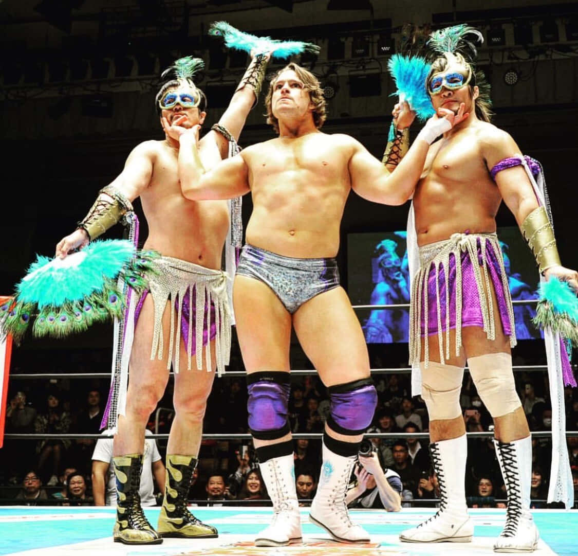 Aew Wrestler Dalton Castle With Hiroshi Tanahashi And Ryusuke Taguchi Wallpaper