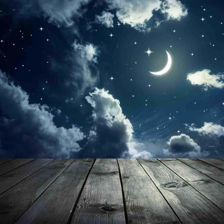 Affascinantepaesaggio Notturno Illuminato Dalla Luna