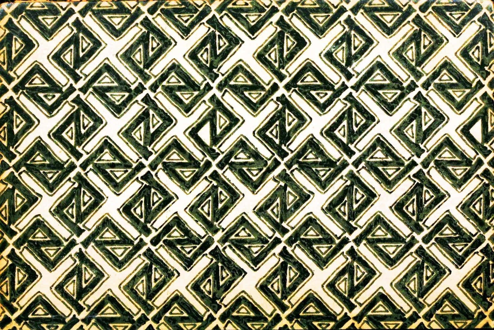 Etgrønt Og Hvidt Geometrisk Mønster På En Træoverflade.
