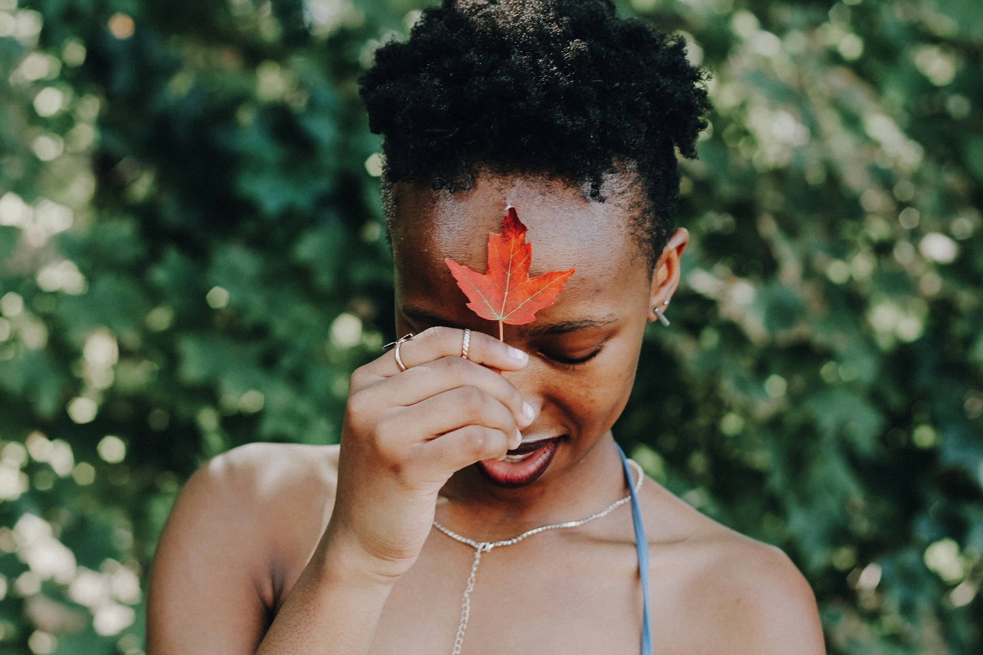 African Girl With Maple Leaf Wallpaper