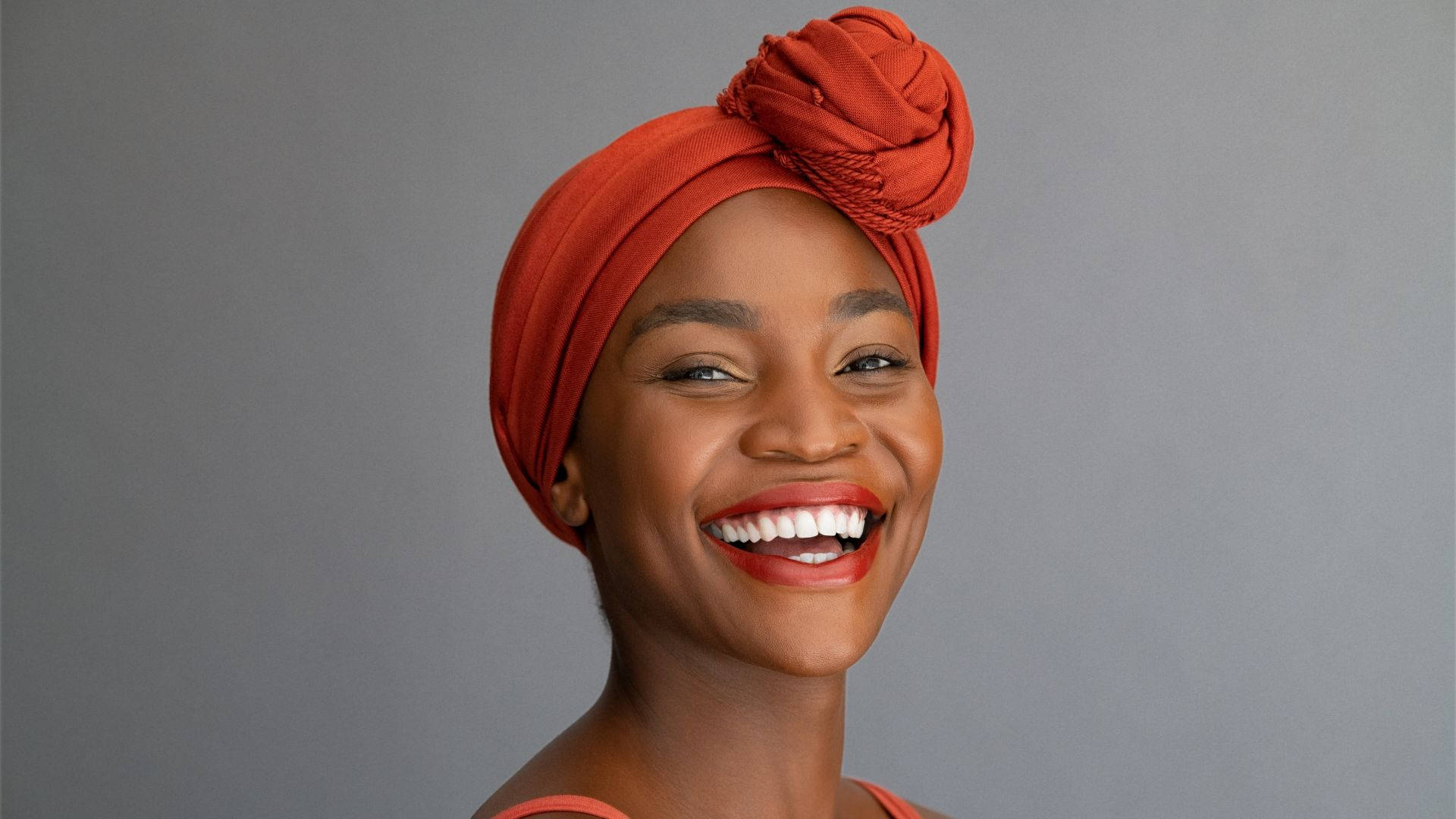 African Woman Wearing Orange Headscarf Picture