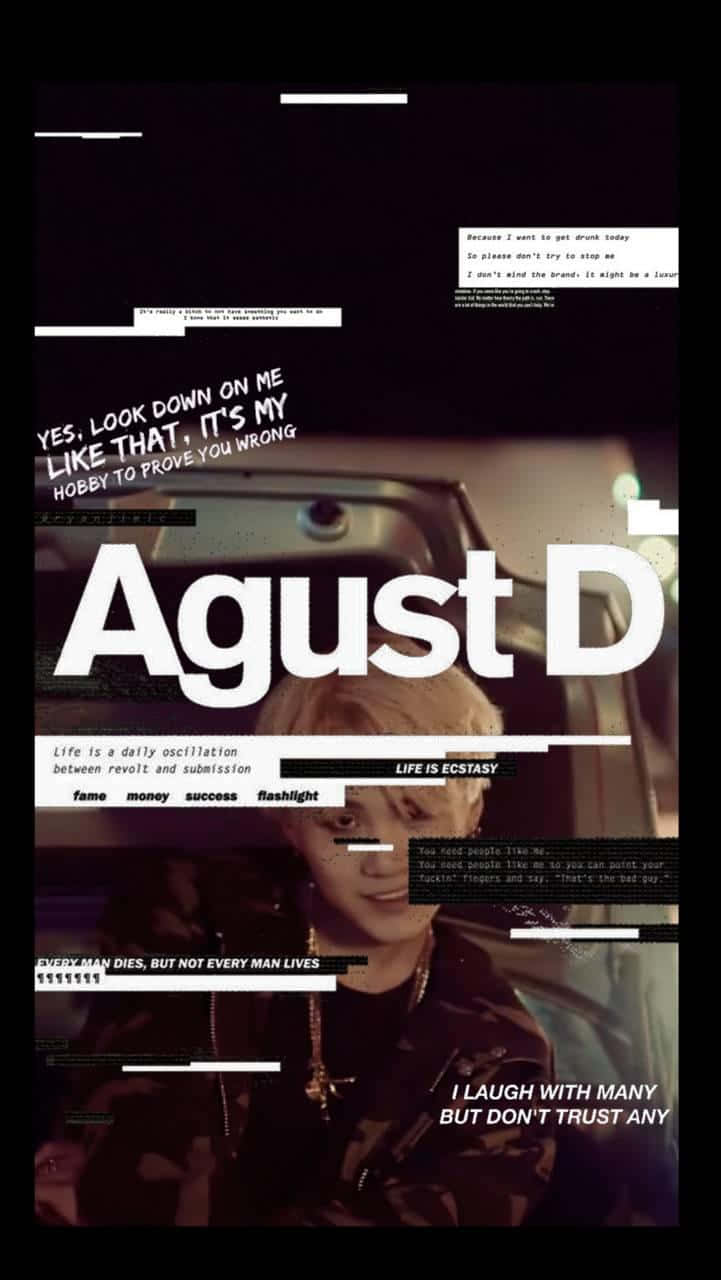 Agust D with Intense Gaze and Urban Background Wallpaper