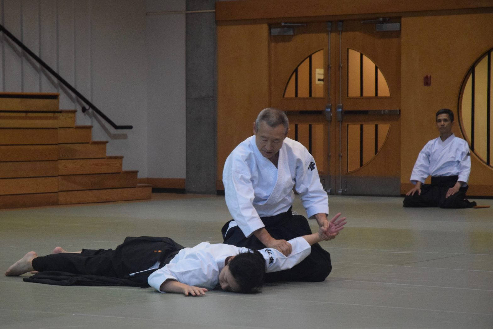 Aikidoka Performing Nikyo Aikido Technique Wallpaper