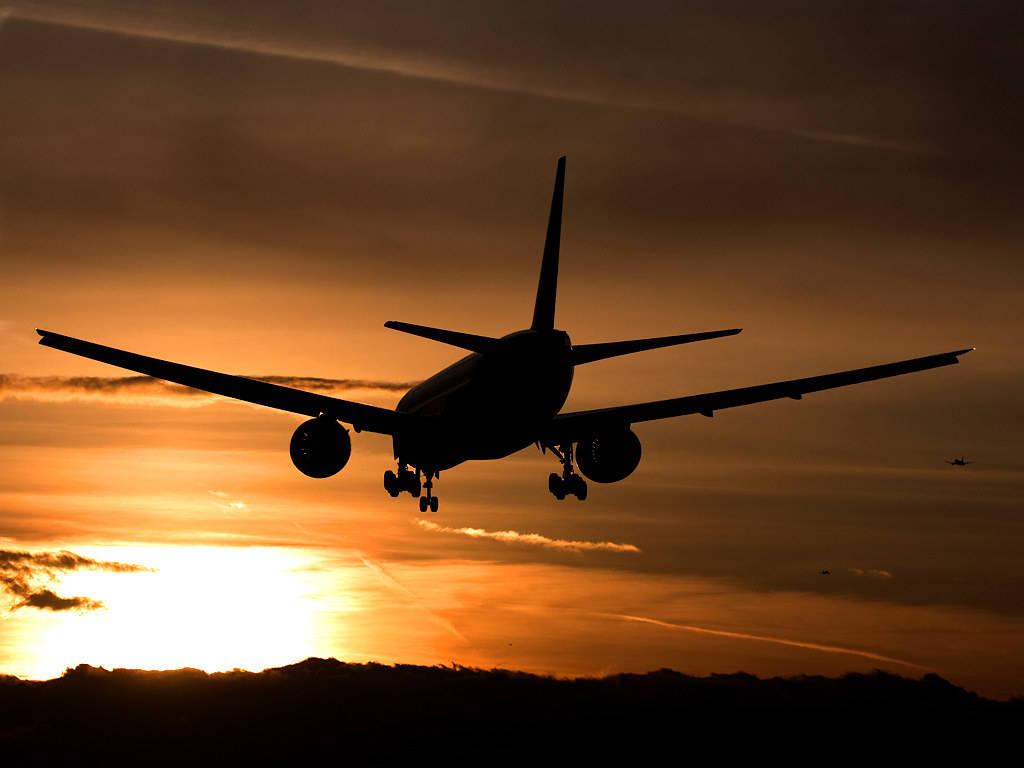 Airindia Flugzeug In Malerischem Sonnenuntergang Wallpaper
