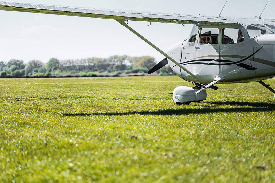 Airplane And Field Golfing Desktop Wallpaper