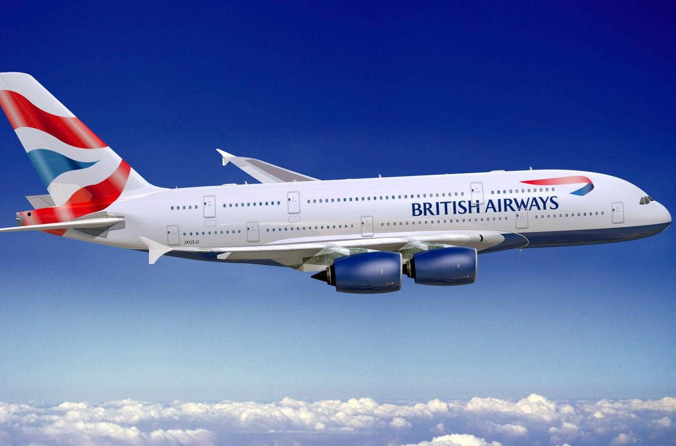 Flygplanfrån British Airways Ovan Molnen. Wallpaper