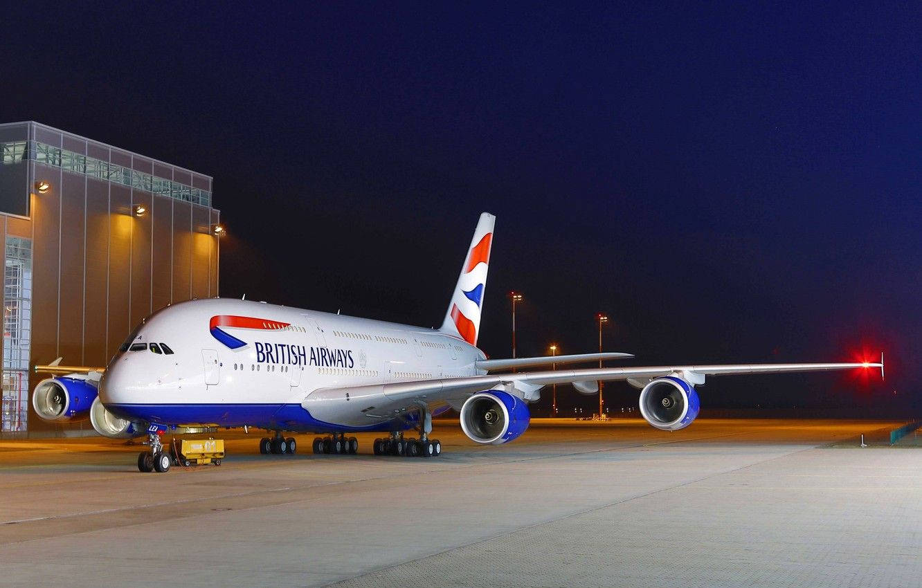 Airplane From British Airways Parked On Runway Wallpaper
