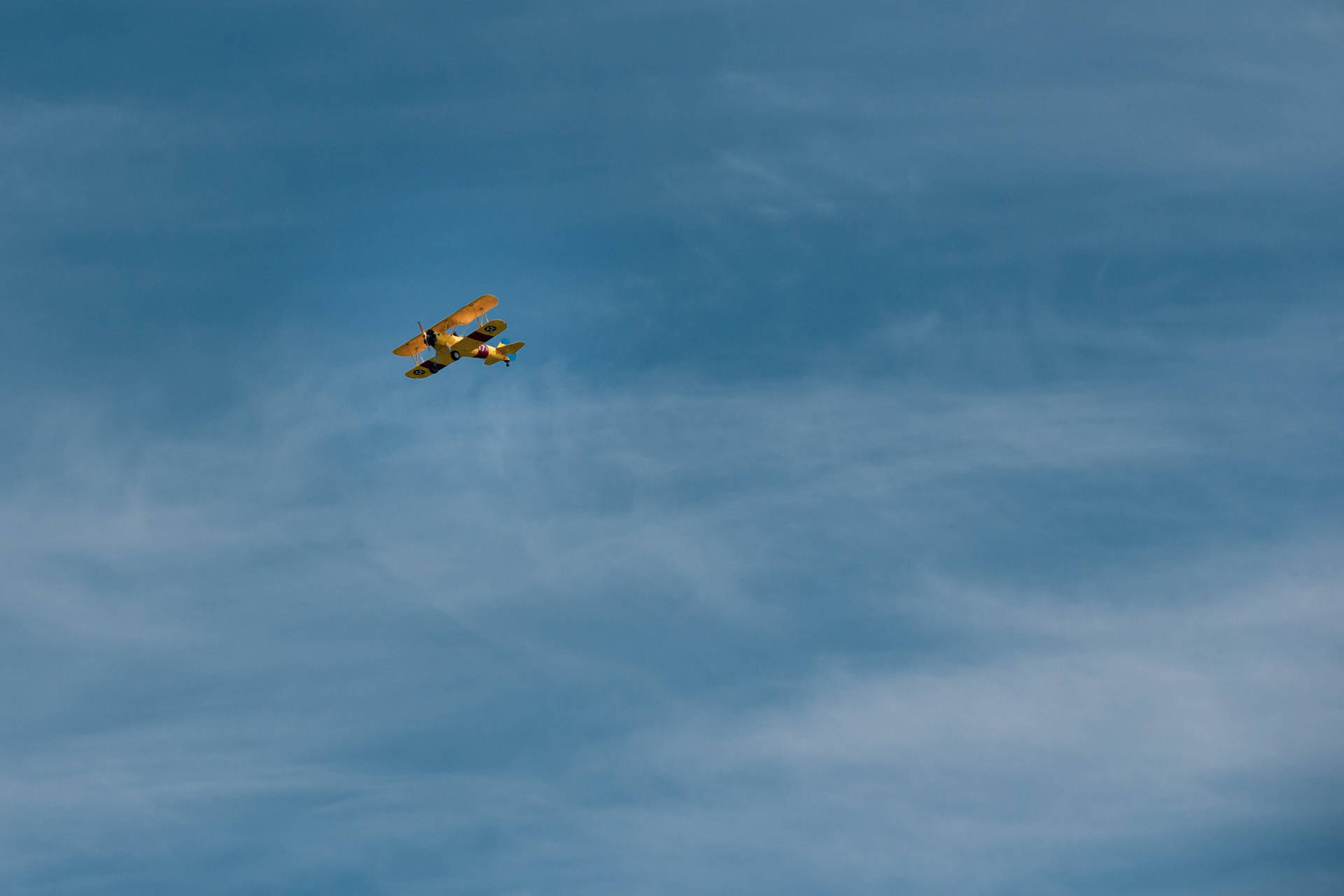Airplane In Navy Blue Sky Background