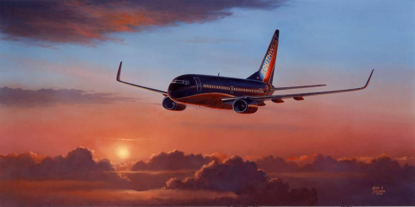 Flygplanöver Solnedgång På Southwest Airlines Wallpaper