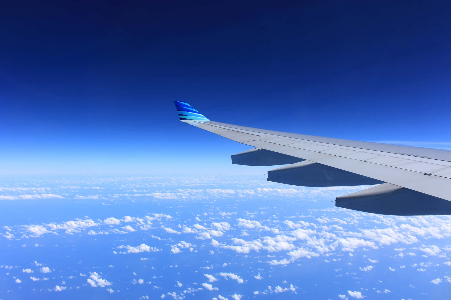 A majestic airline soars across vast crystalline skies.