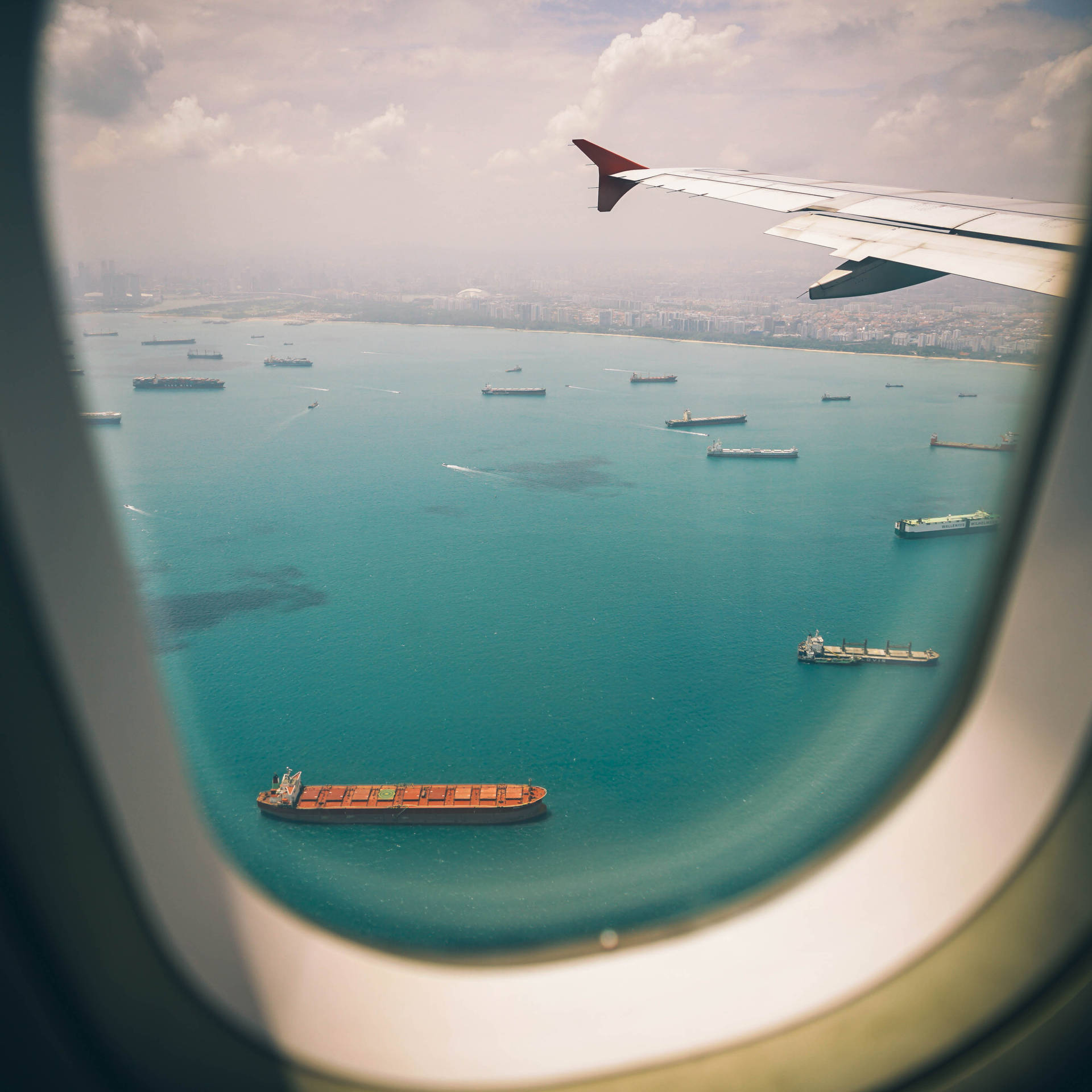 Ventanade Avión, Vista Viajando Sobre El Océano Fondo de pantalla