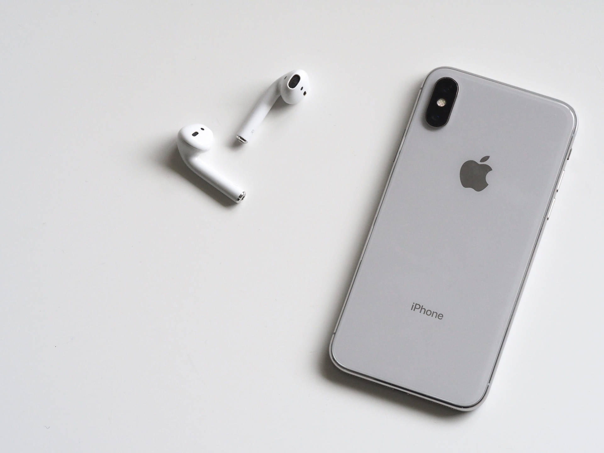 Airpods Med Iphone X Wallpaper