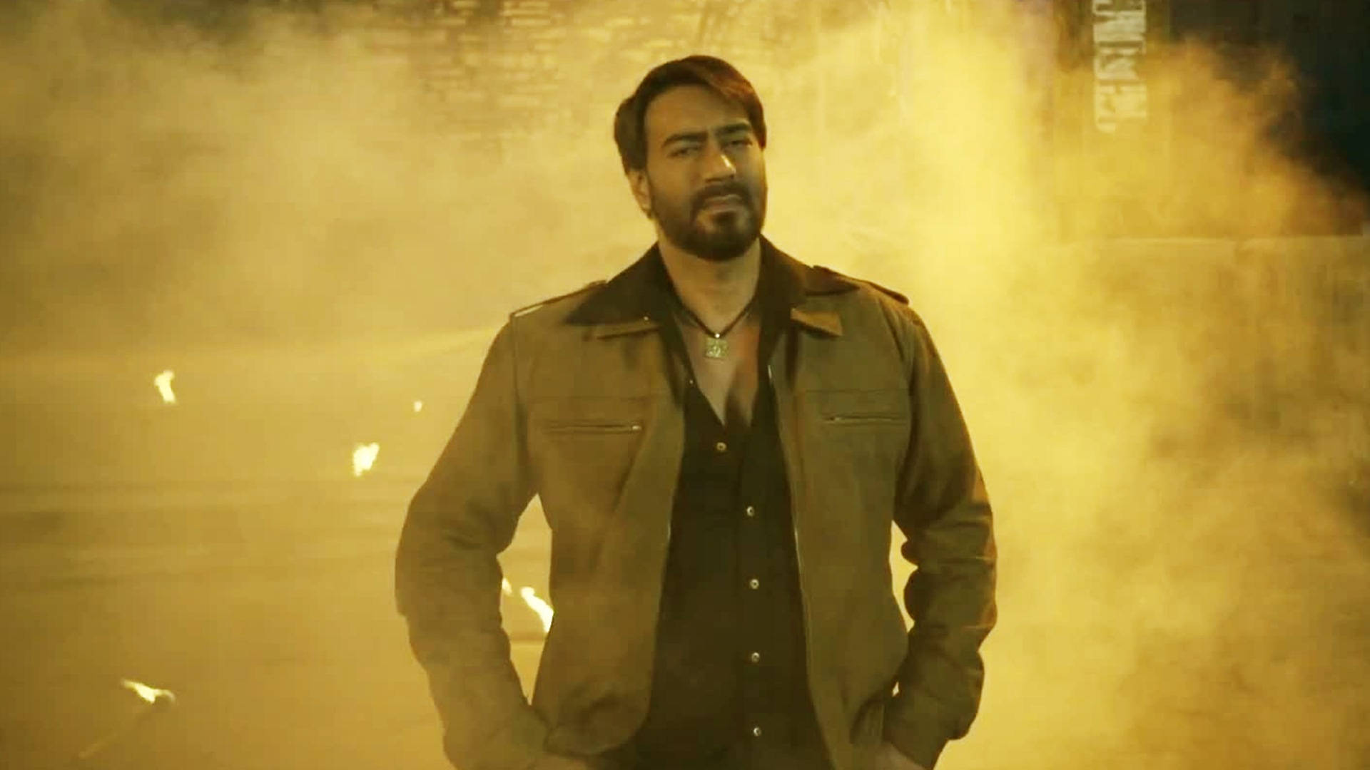 Ajay Devgn In Brown Jacket Outfit Wallpaper