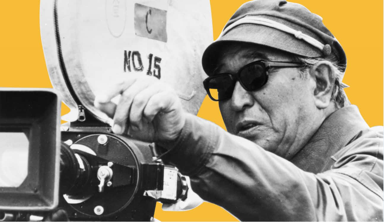 Akira Kurosawa behind the scenes of a movie production Wallpaper