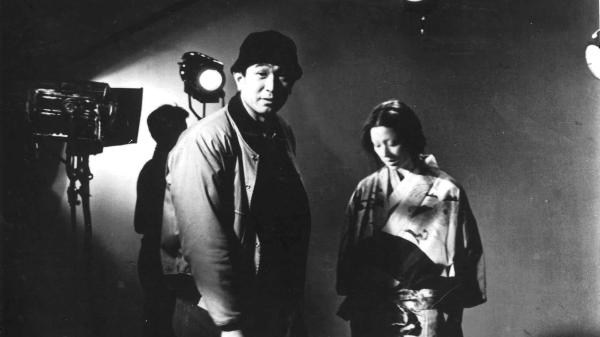 Akira Kurosawa on the set of a film Wallpaper