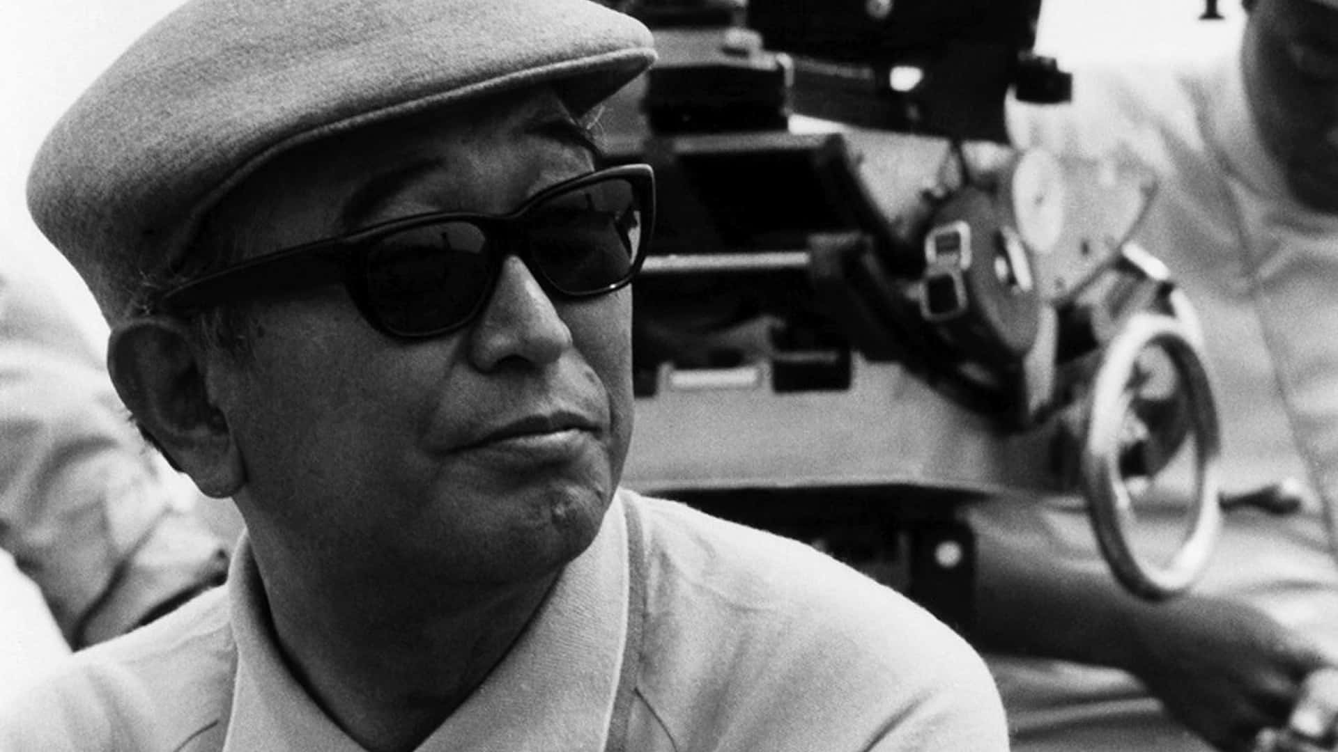 A black and white portrait of Japanese filmmaker Akira Kurosawa Wallpaper