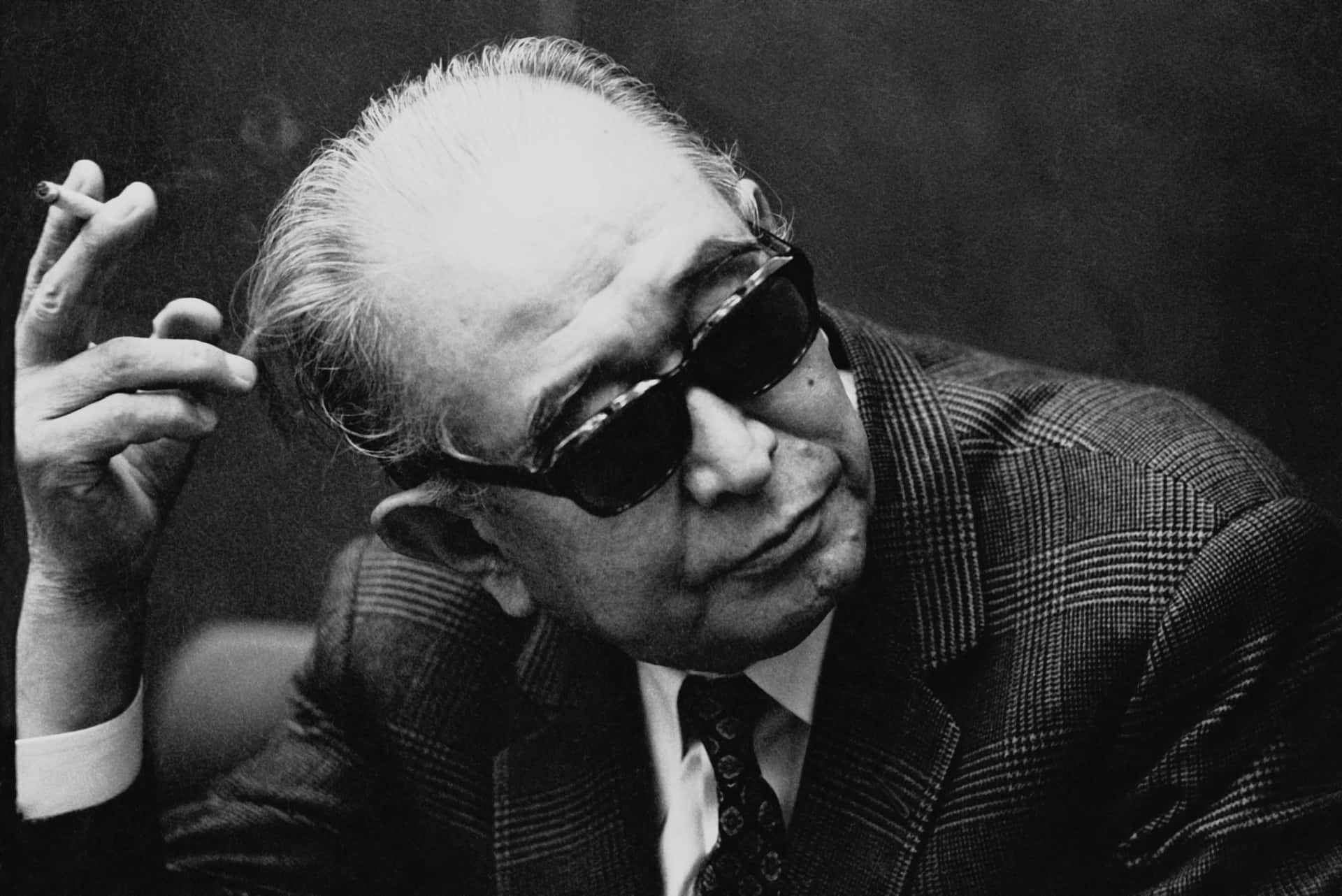 Akira Kurosawa on the set of one of his iconic films Wallpaper