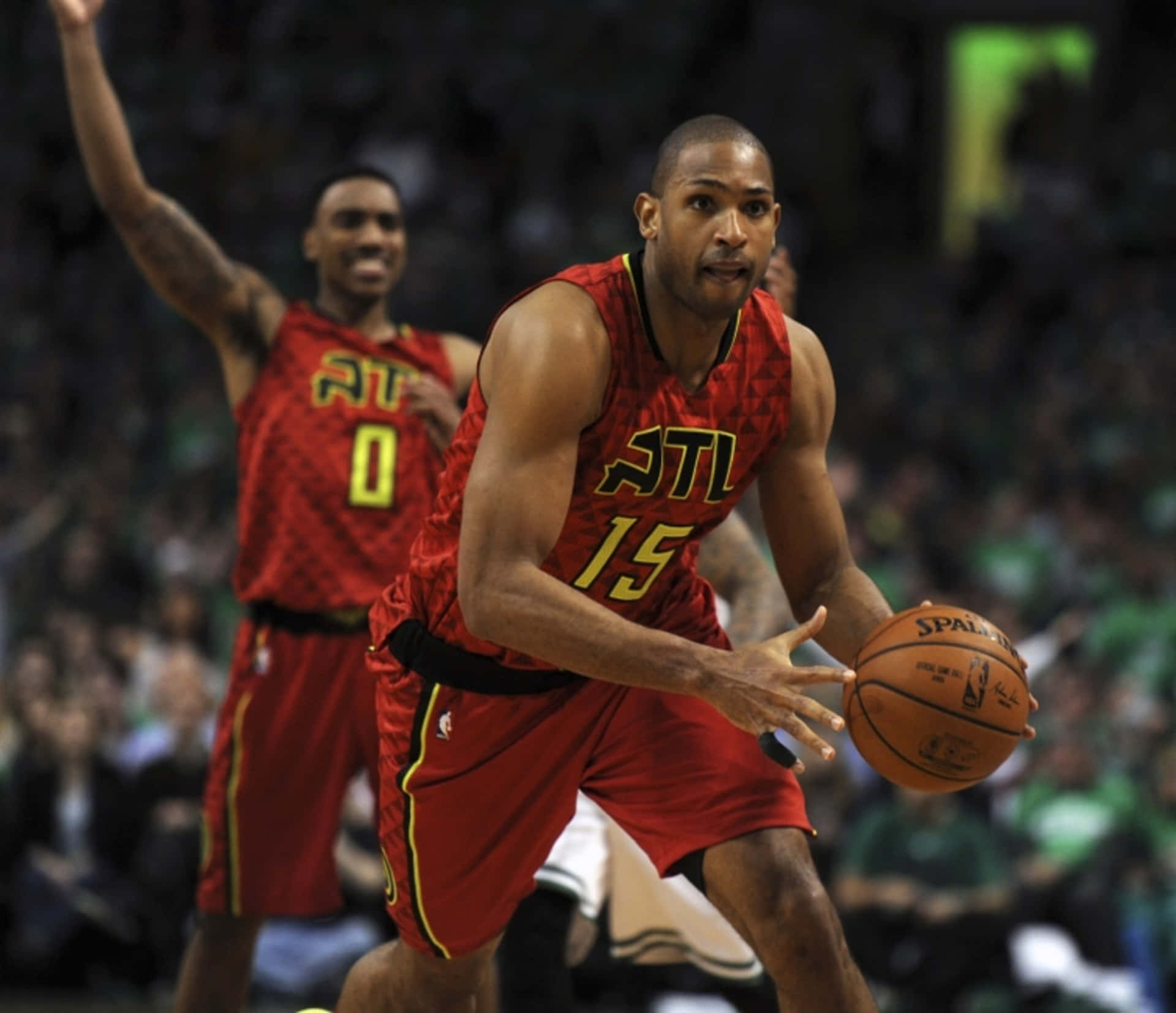 Al Horford of the Philadelphia 76ers leads his team on the court