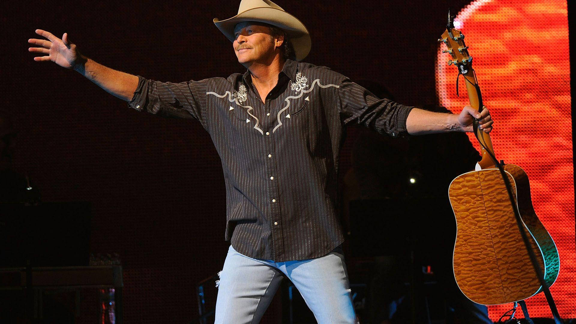 Alan Jackson Arms Open On Stage Wallpaper