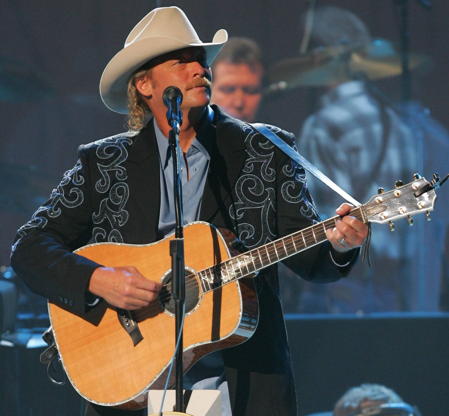 Alan Jackson With Guitar On Stage Wallpaper