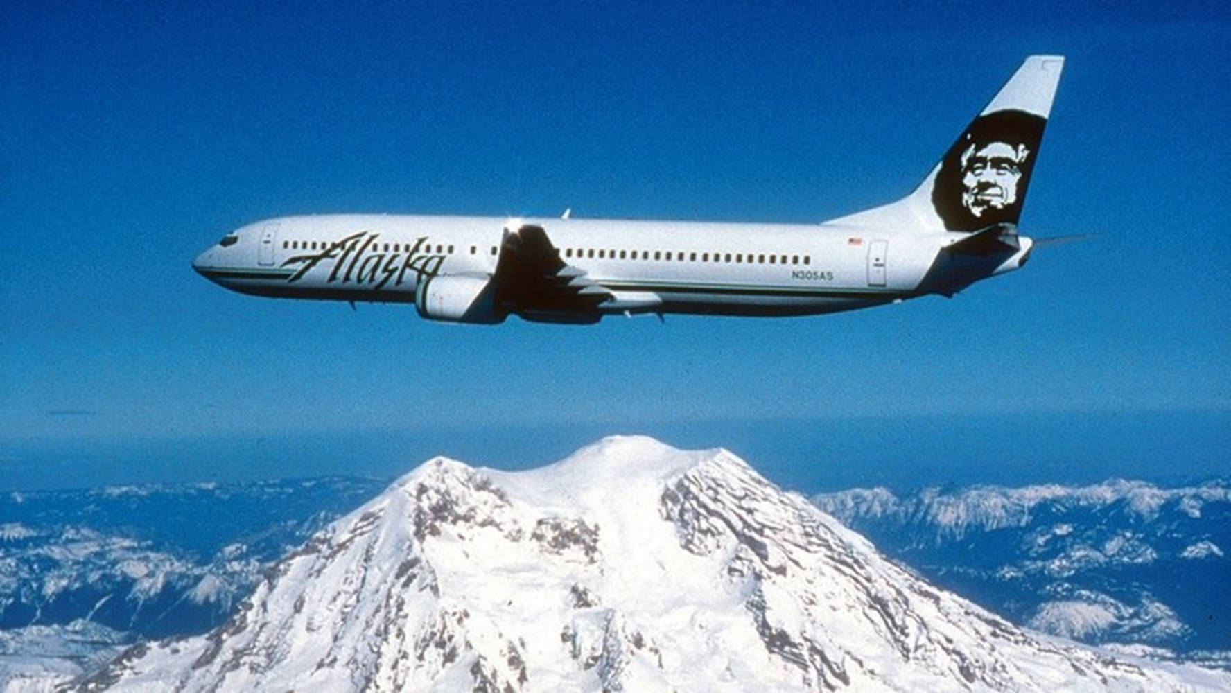 Alaska Airlines Above Mountain Peak Wallpaper