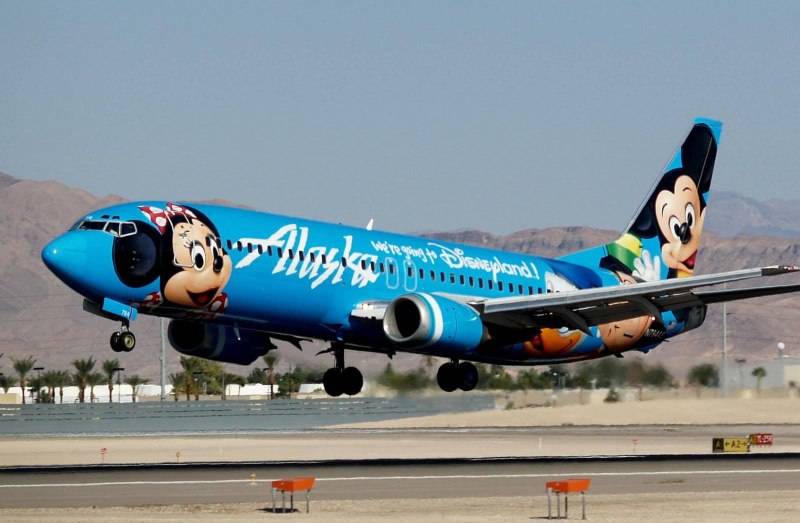 Alaska Airlines Blue Mickey Mouse Plane Wallpaper