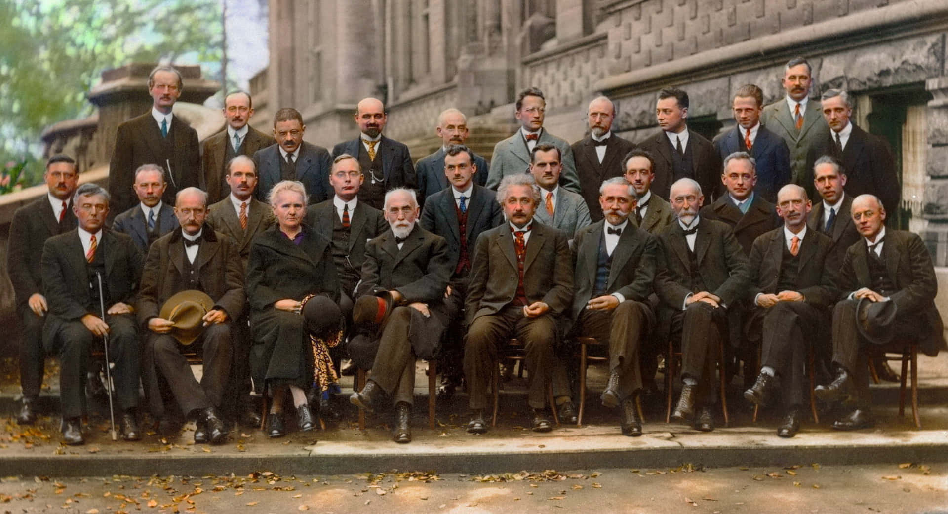 A Group Of Men In Suits Posing For A Picture