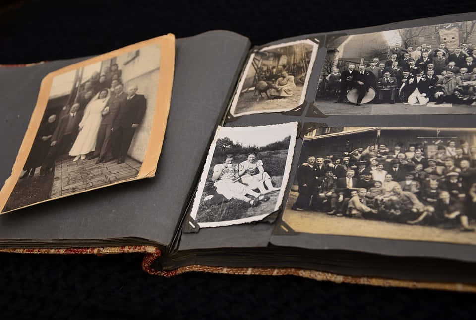 a book with photos of people and a family