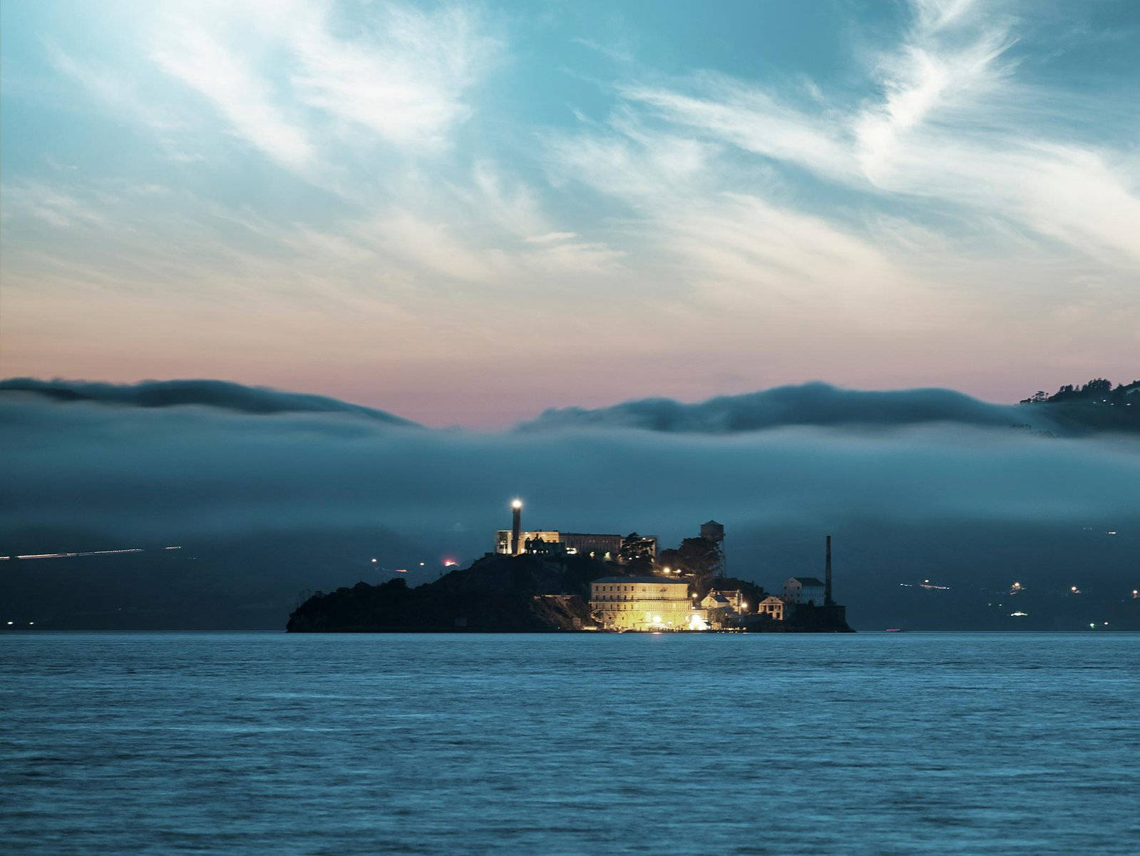 Enigmatic Alcatraz Island under the Starlit Sky Wallpaper