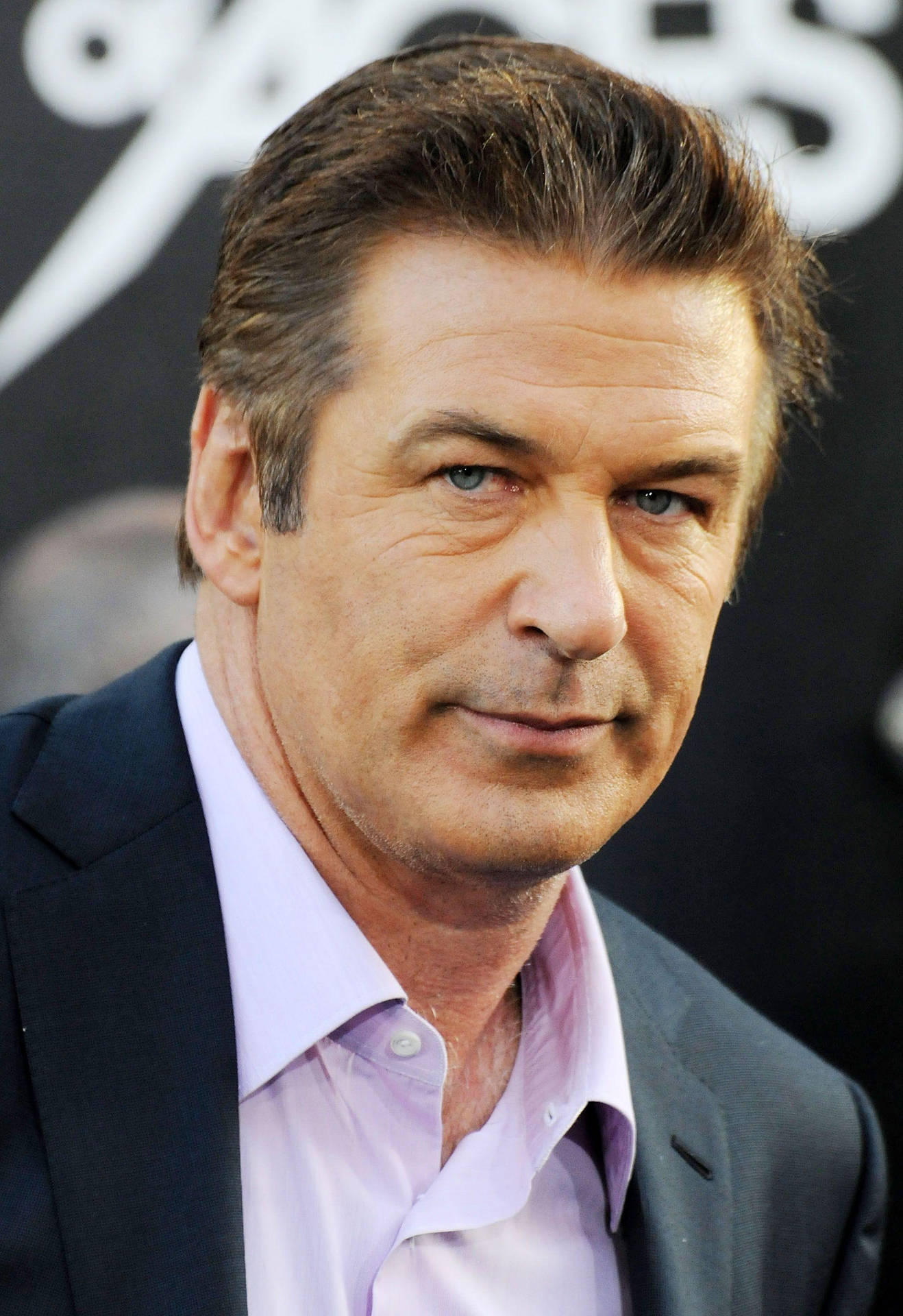 Alec Baldwin In An Event Background