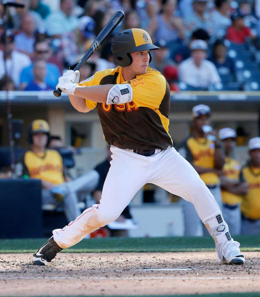 Alex Bregman Swinging Bat In Yellow And Black Uniform