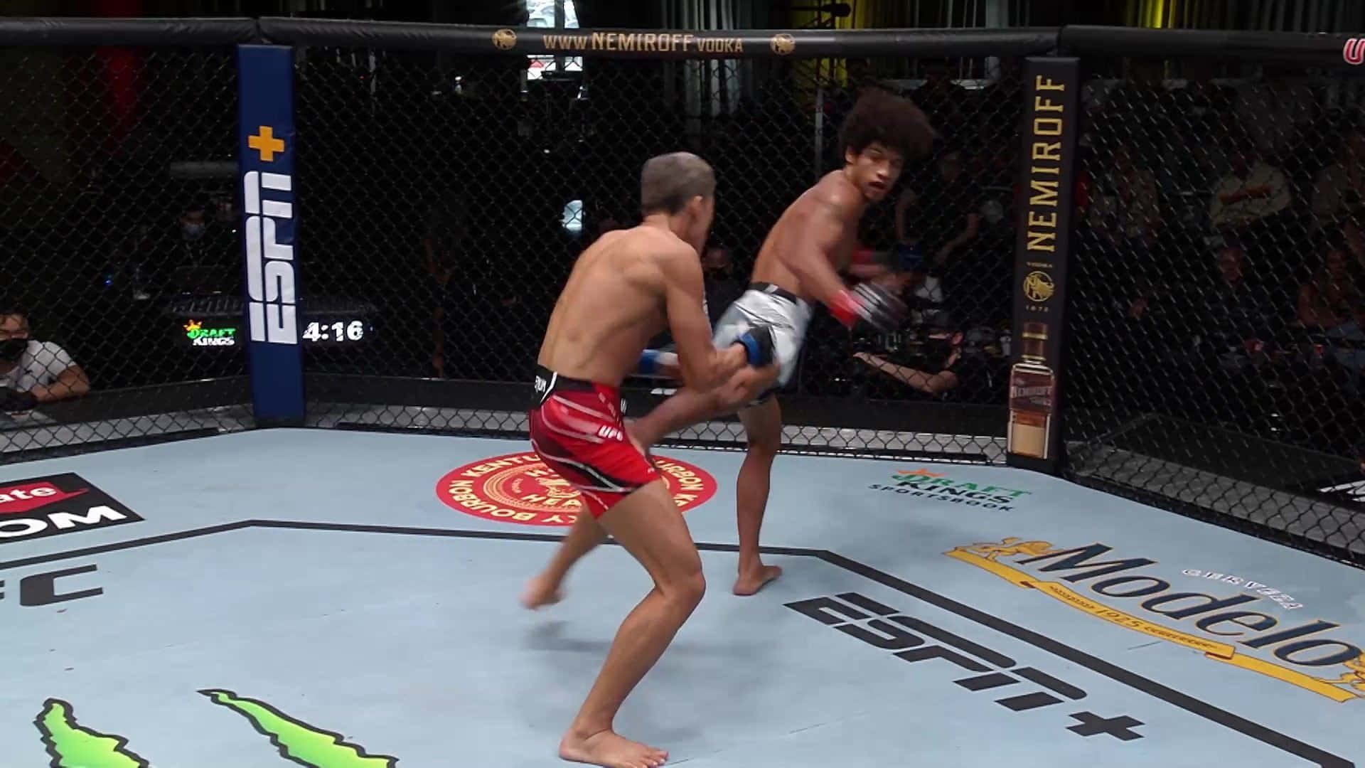 Alex Caceres Kicking Opponent Wallpaper