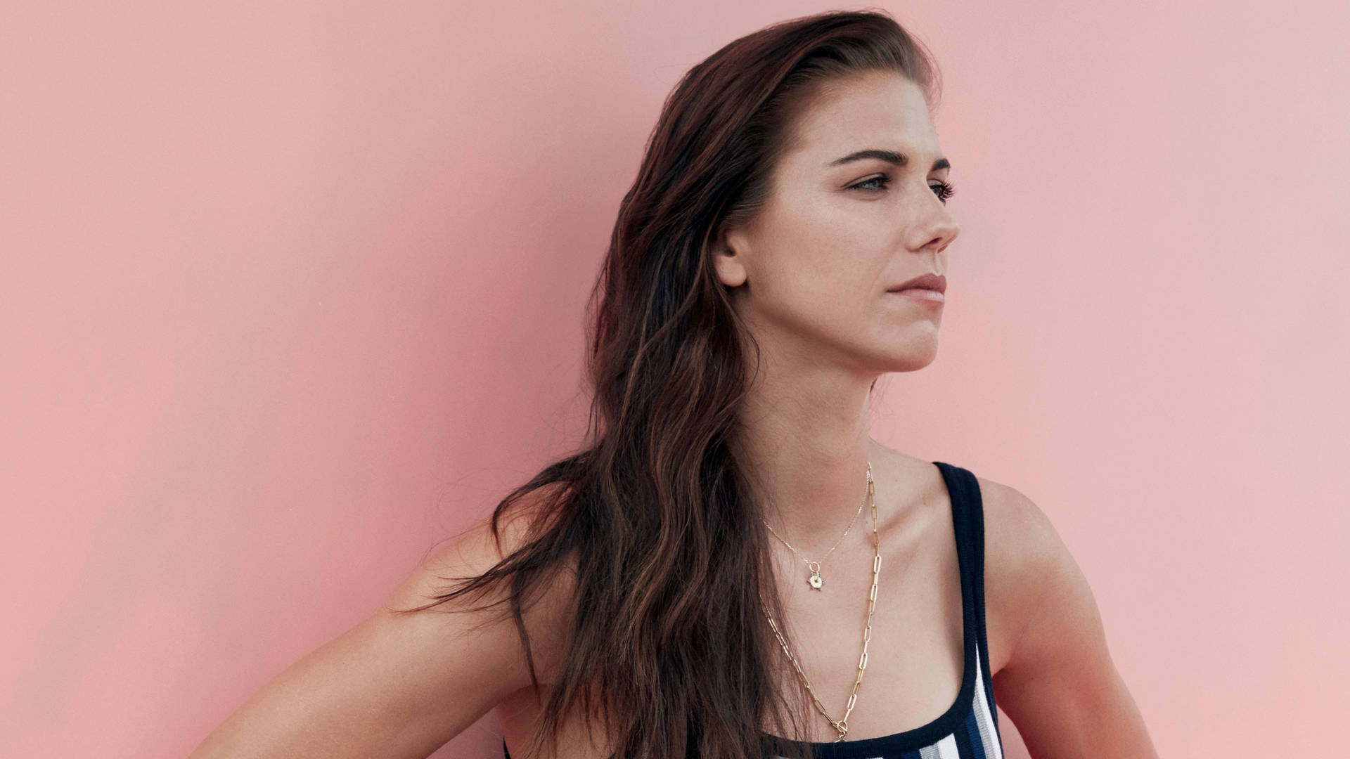Alex Morgan In Pink Wall Background