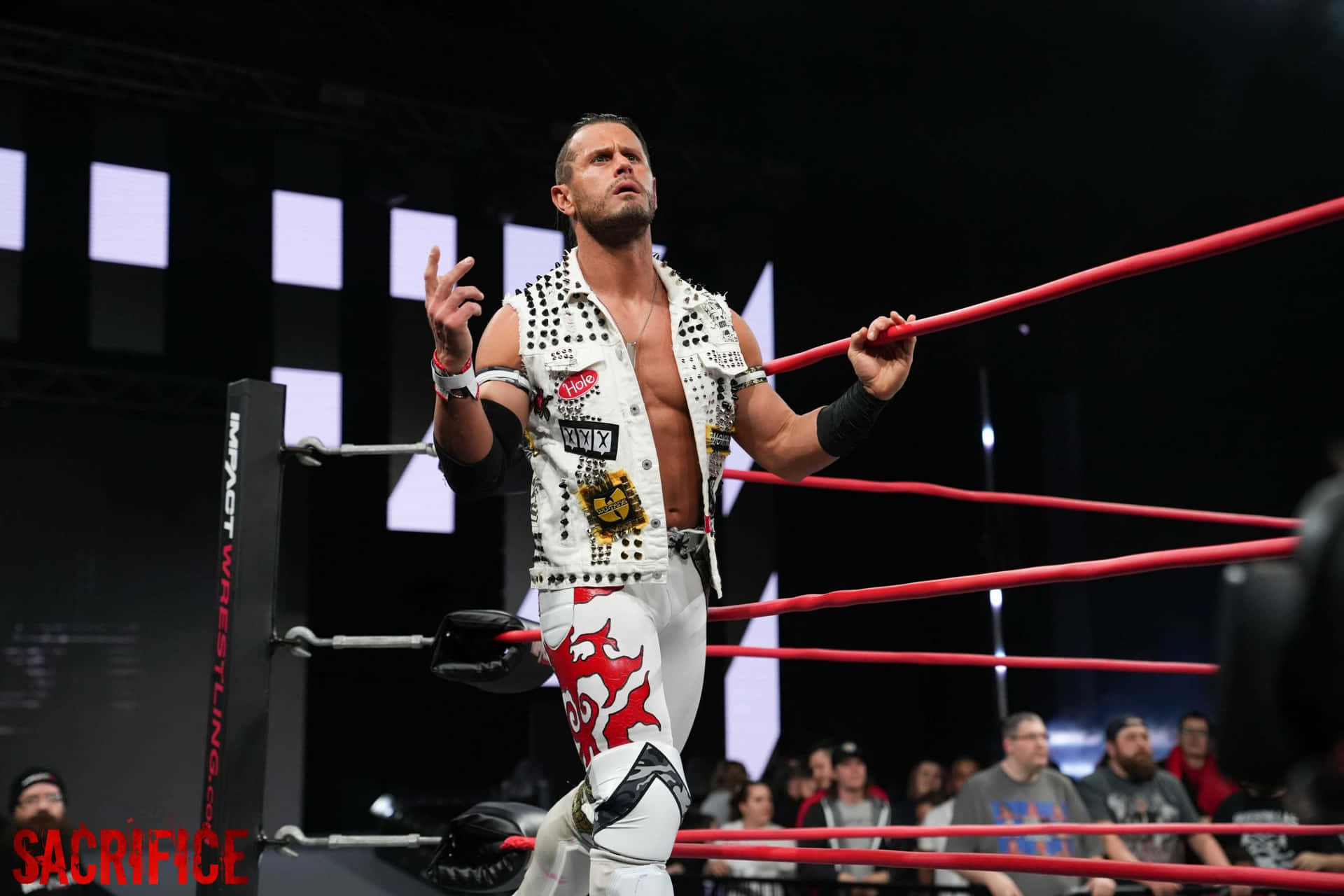 Professional Wrestler Alex Shelley Making a Grand Entrance at Impact Wrestling Sacrifice Wallpaper