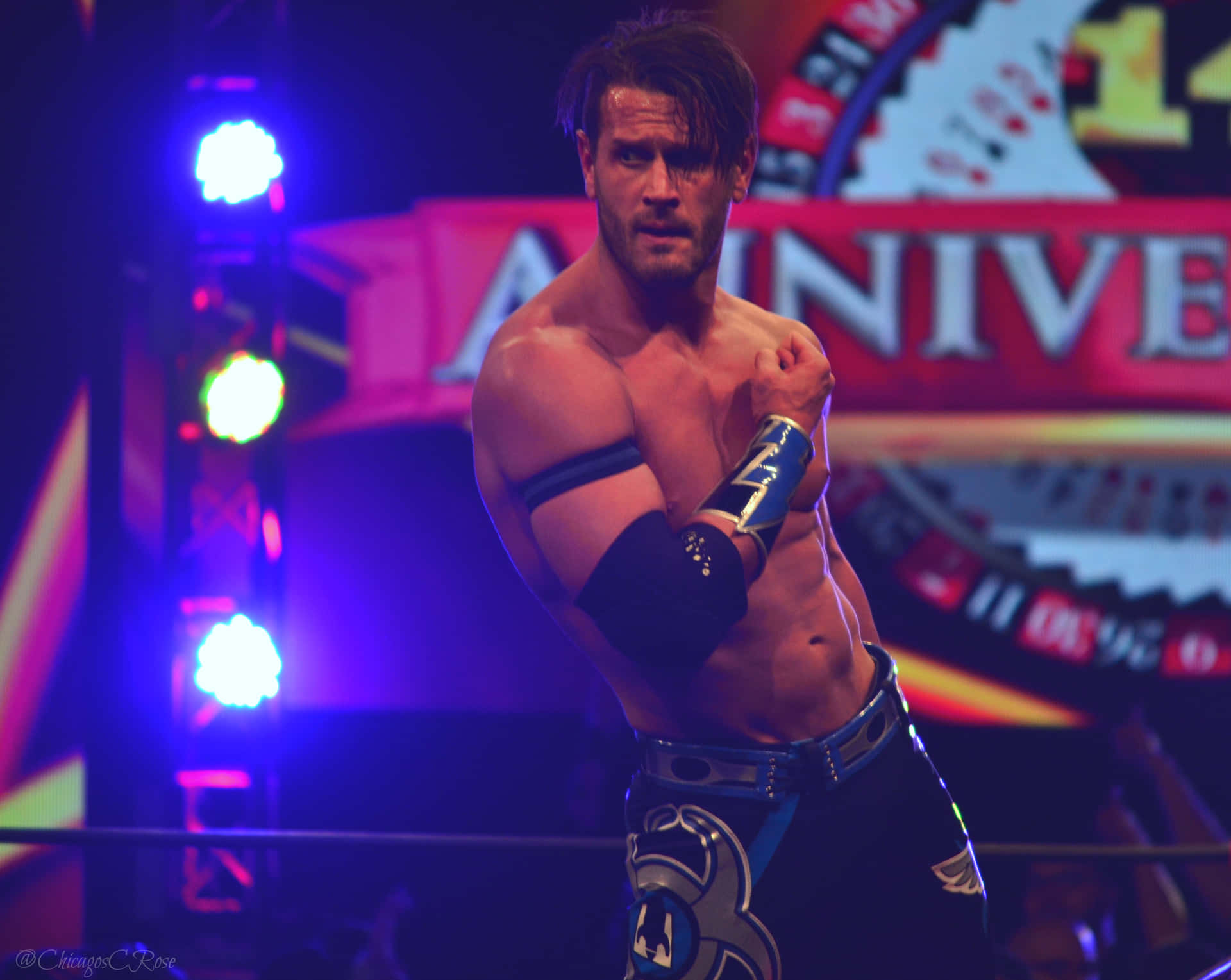 Alex Shelley dominating at Impact Wrestling Anniversary Event Wallpaper