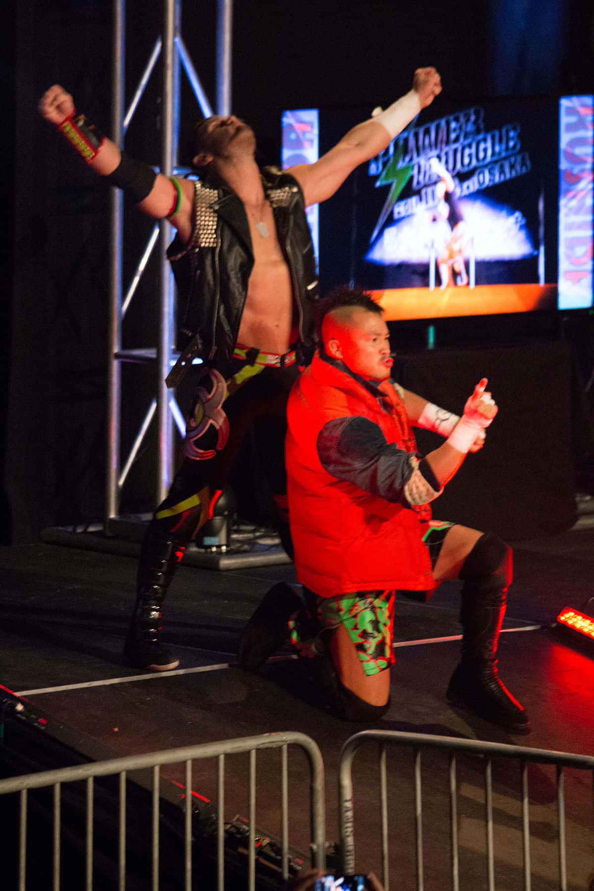 Professional Wrestler Alex Shelley Making an Entrance with Yujiro Kushida during the Dusty Classic Tournament Wallpaper