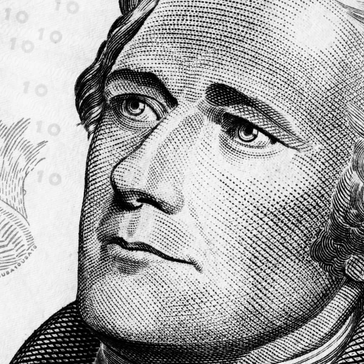 A Close Up Of A Portrait Of George Washington On A One Dollar Bill