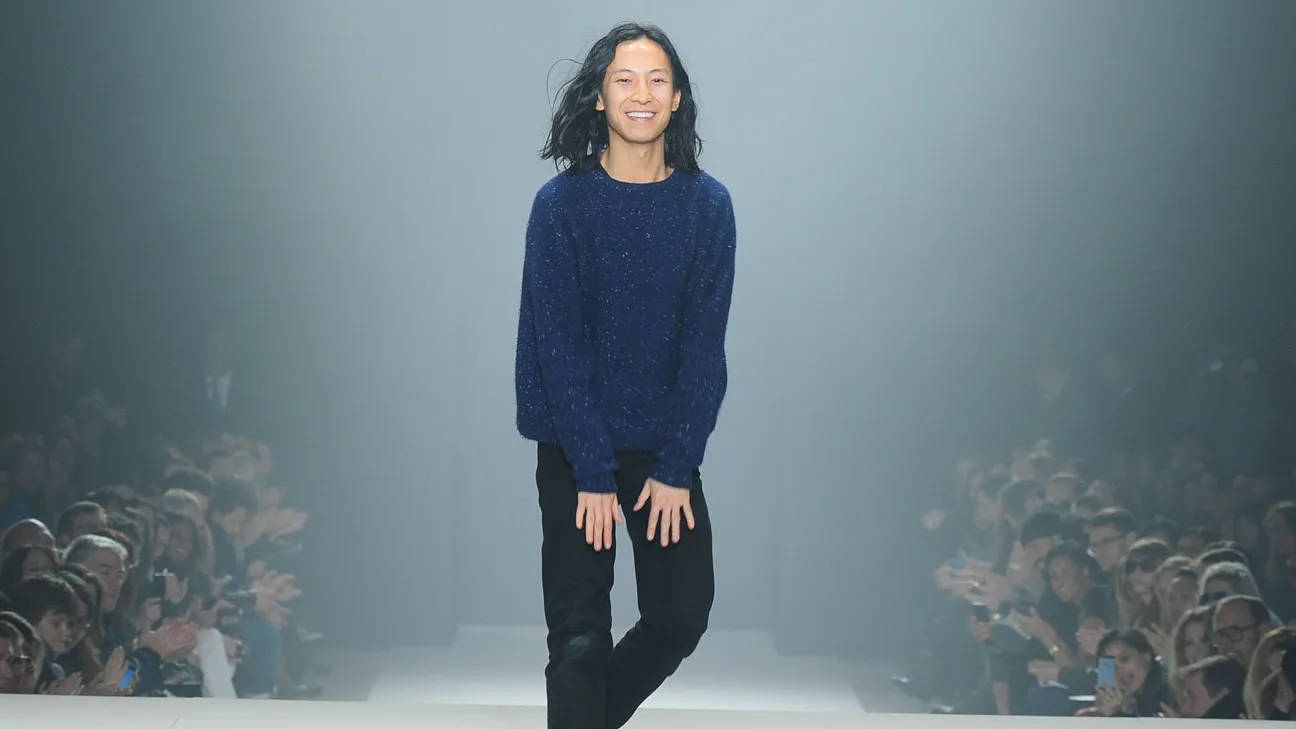 Renowned Fashion Designer Alexander Wang Sporting a Stylish Blue Sweater Wallpaper