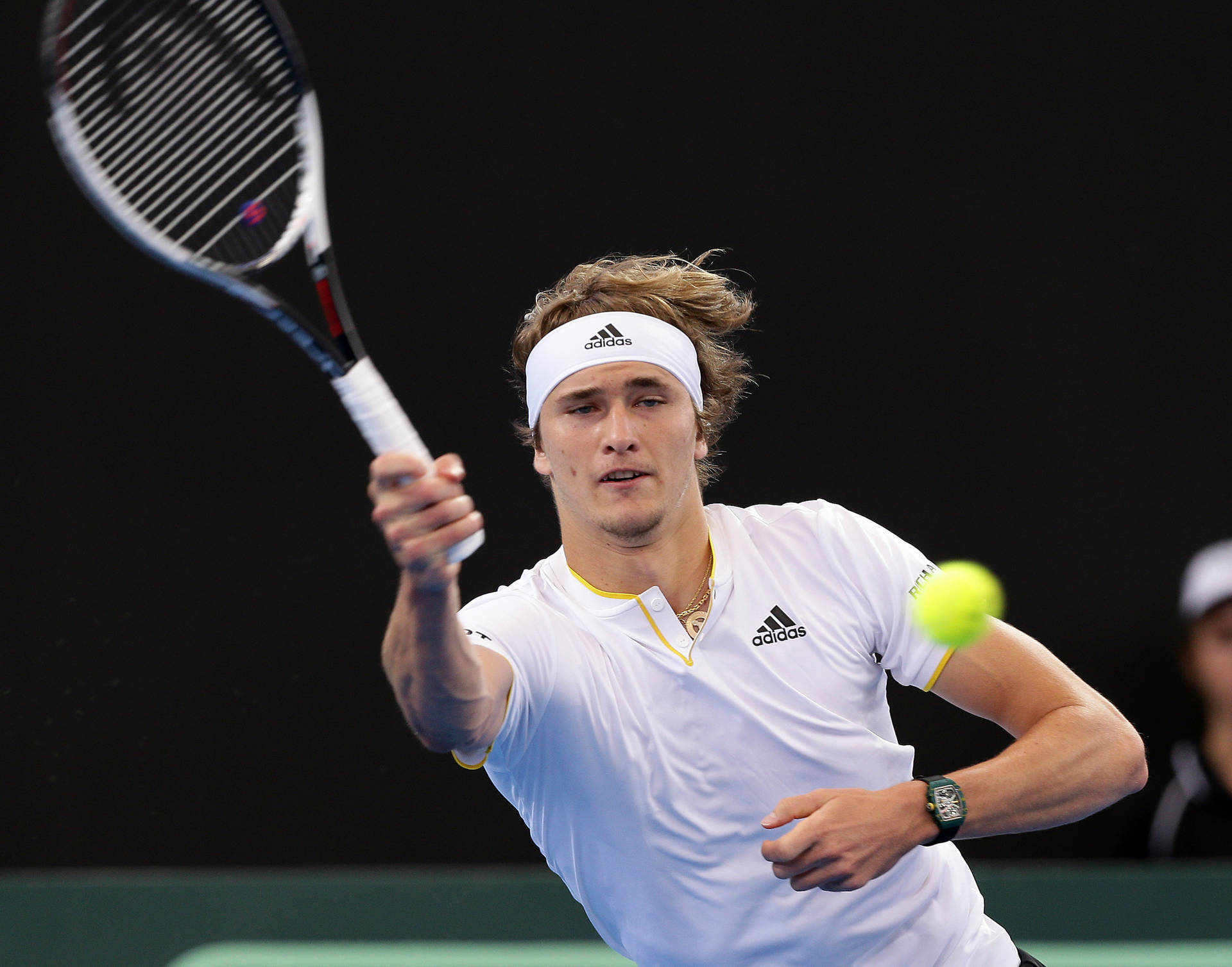 Alexander Zverev Delivers a Forehand Volley on Court Wallpaper