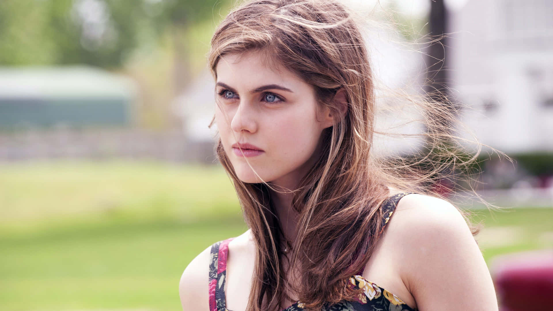 Alexandra Daddario striking a pose in a stunning outfit