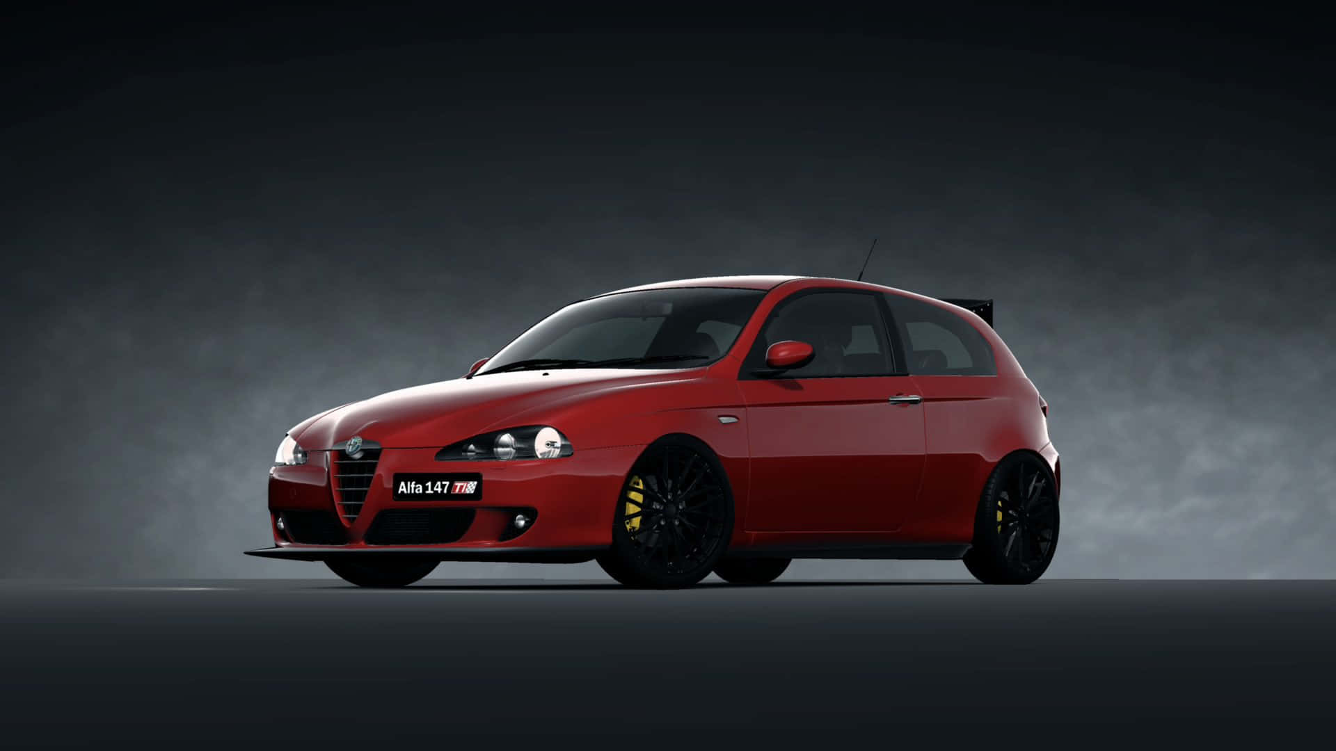 Sleek Alfa Romeo 147 on Display Wallpaper