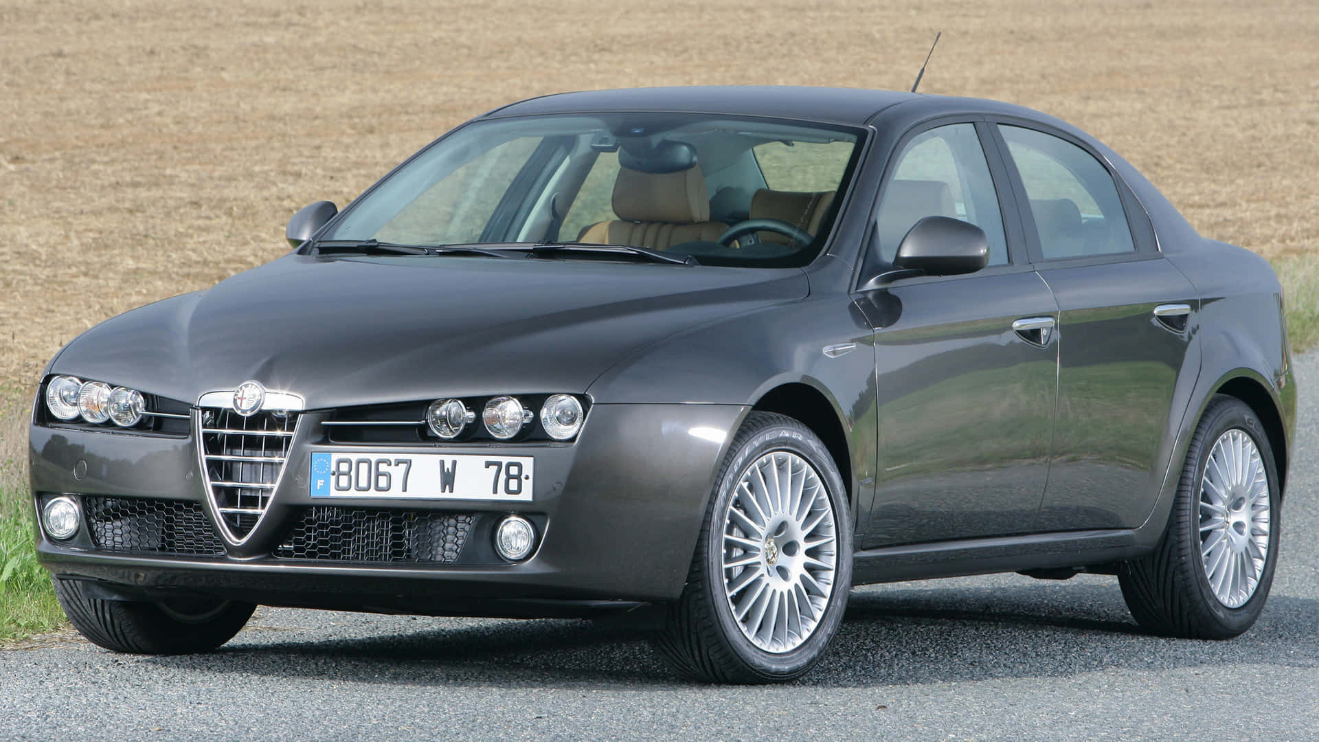 Stunning Alfa Romeo 159 in Motion Wallpaper