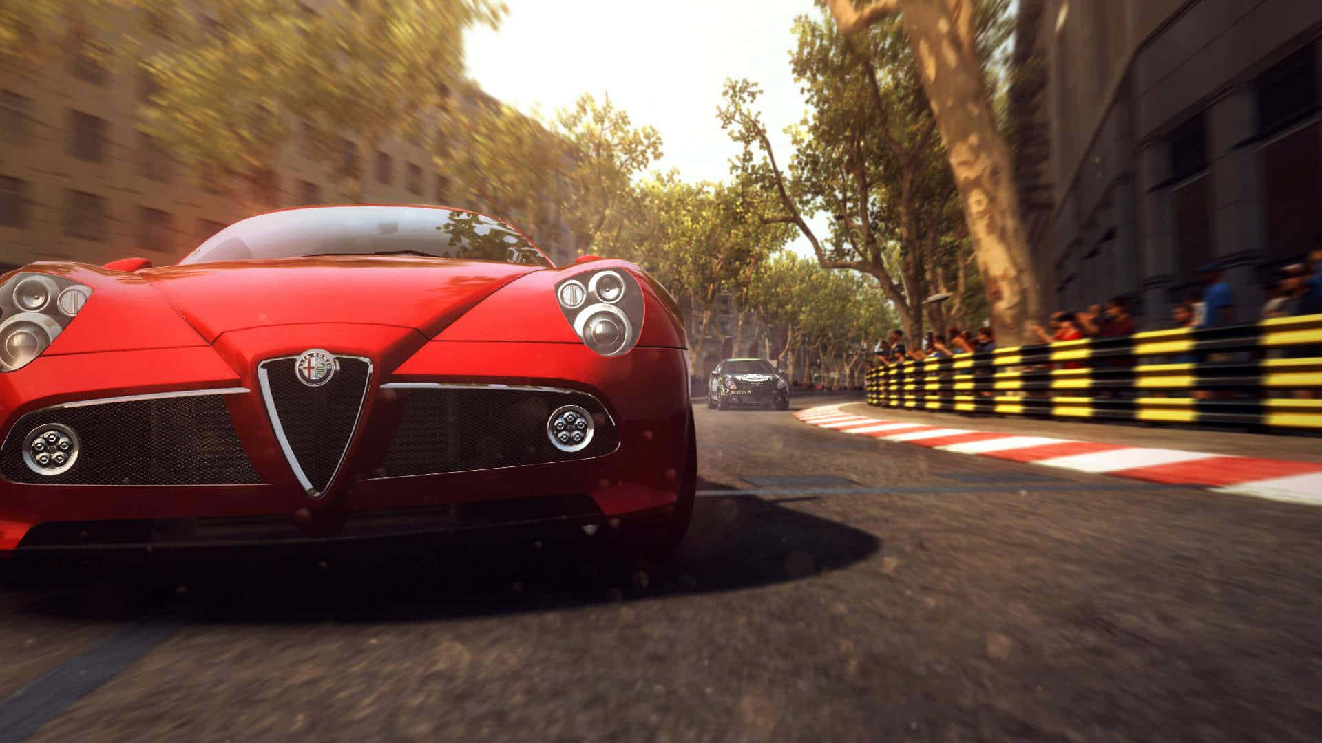 Sleek Alfa Romeo 8C Competizione in Action Wallpaper