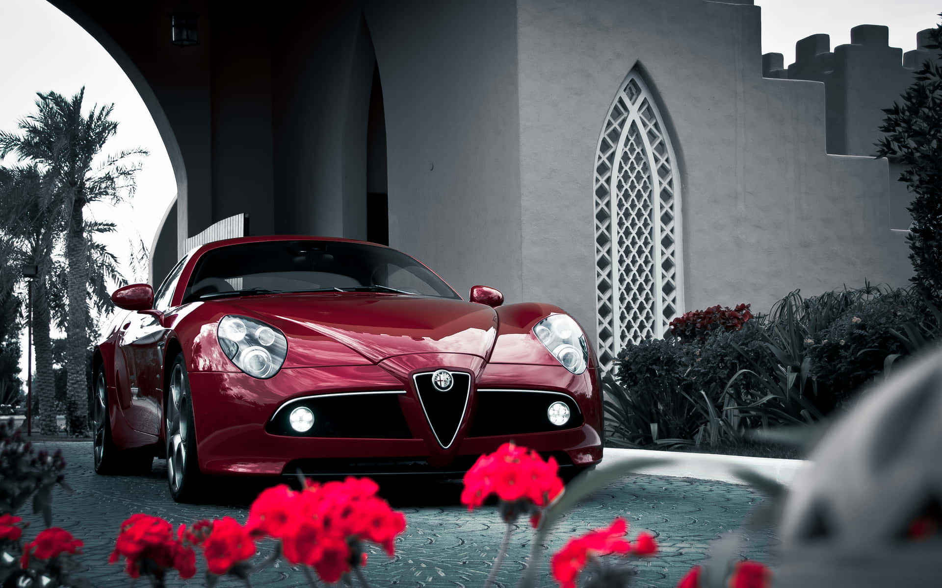 Sleek Alfa Romeo 8C Competizione in Action Wallpaper