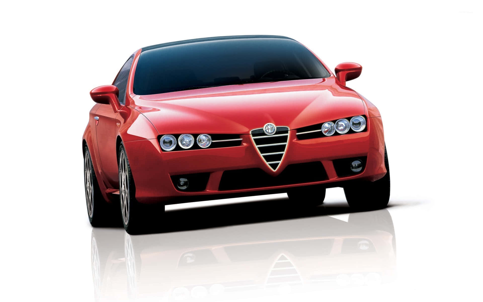 Sleek Alfa Romeo Brera in Elegant Evening Setting Wallpaper