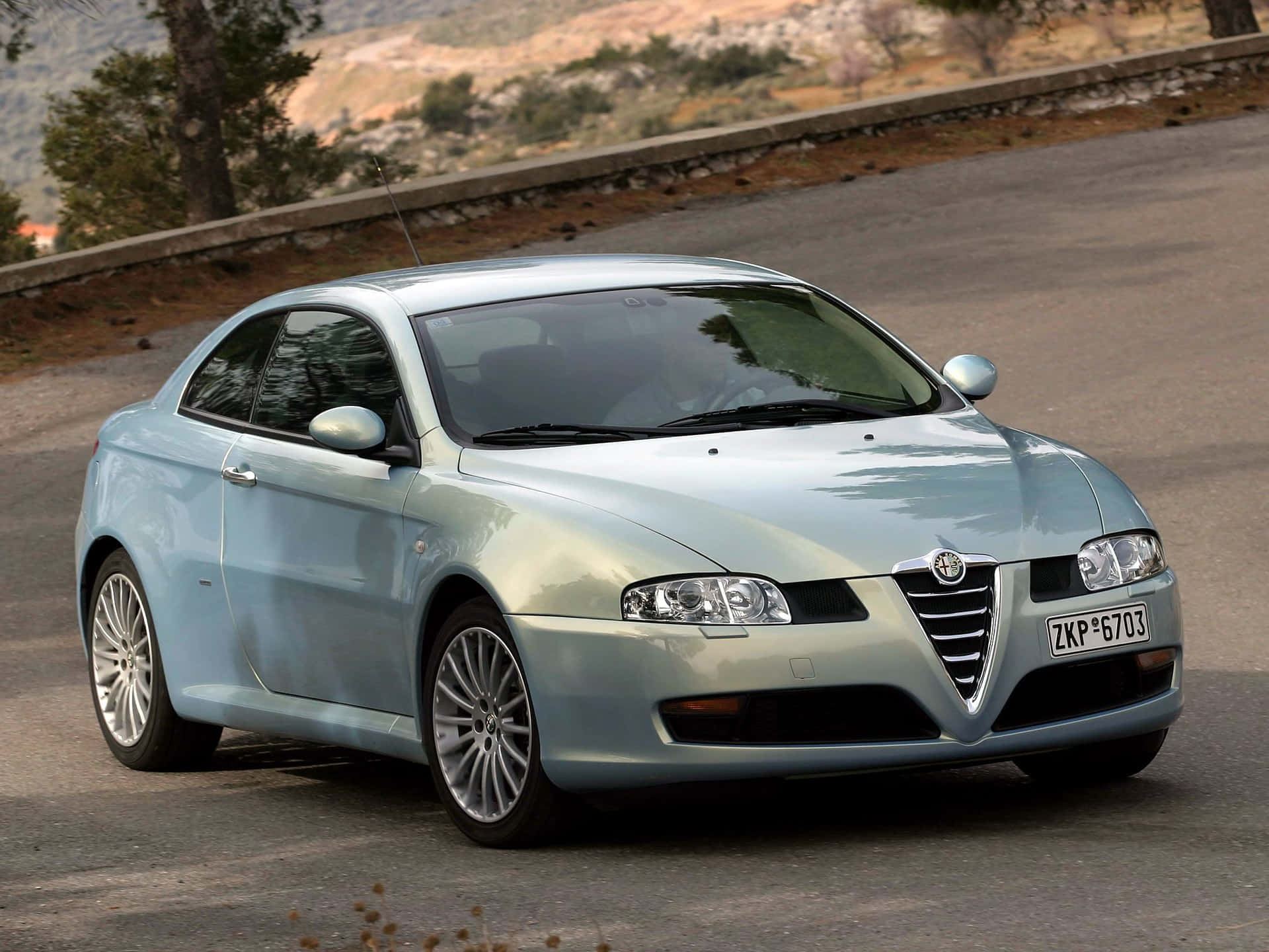 Sleek Alfa Romeo GT Redefined: Performance Meets Luxury Wallpaper