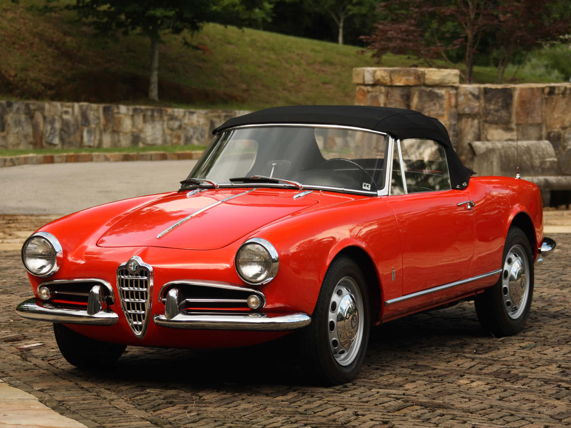 Alfa Romeo Spider - A perfect blend of style and performance on the road. Wallpaper