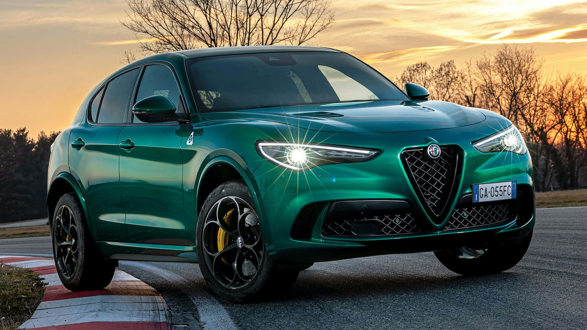 Descubreel Impresionante Alfa Romeo Stelvio En Acción. Fondo de pantalla