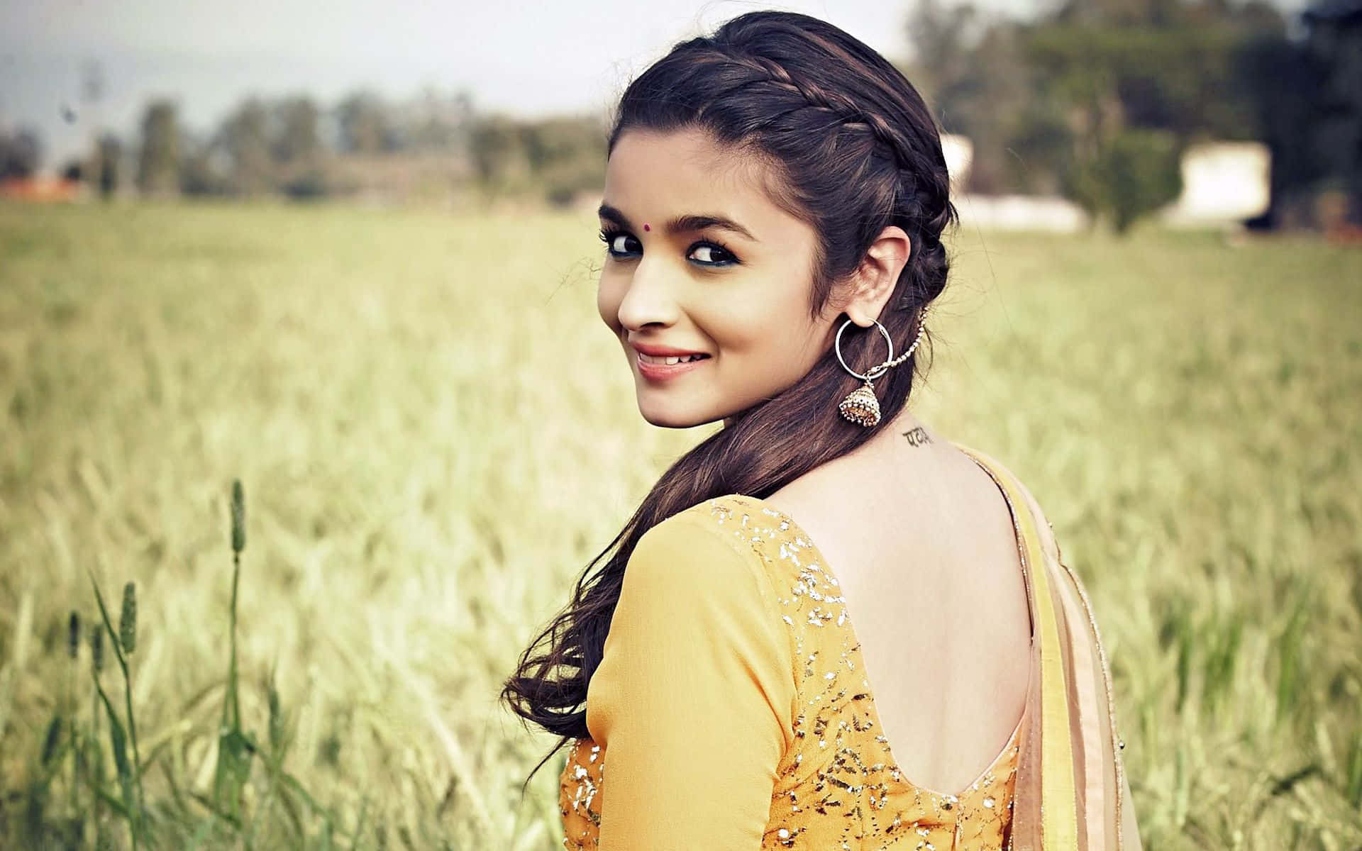 Alia Bhatt wearing a vibrant saree.